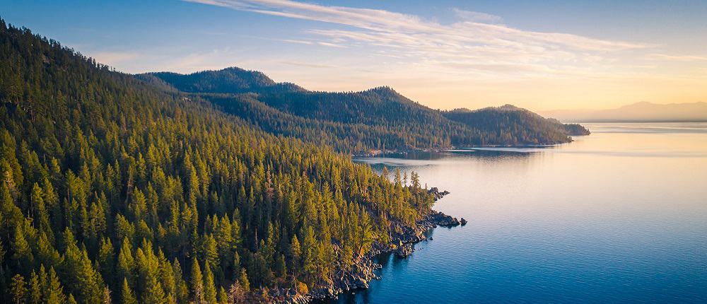Lake Tahoe Shoreline with Mountains and Turquoise Blue Waters